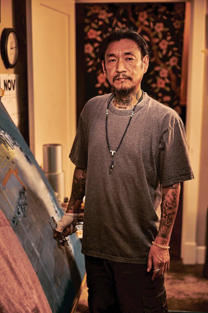 Masonic lowrider artist Shinji Hara of Anaheim no. 207 poses in his home.