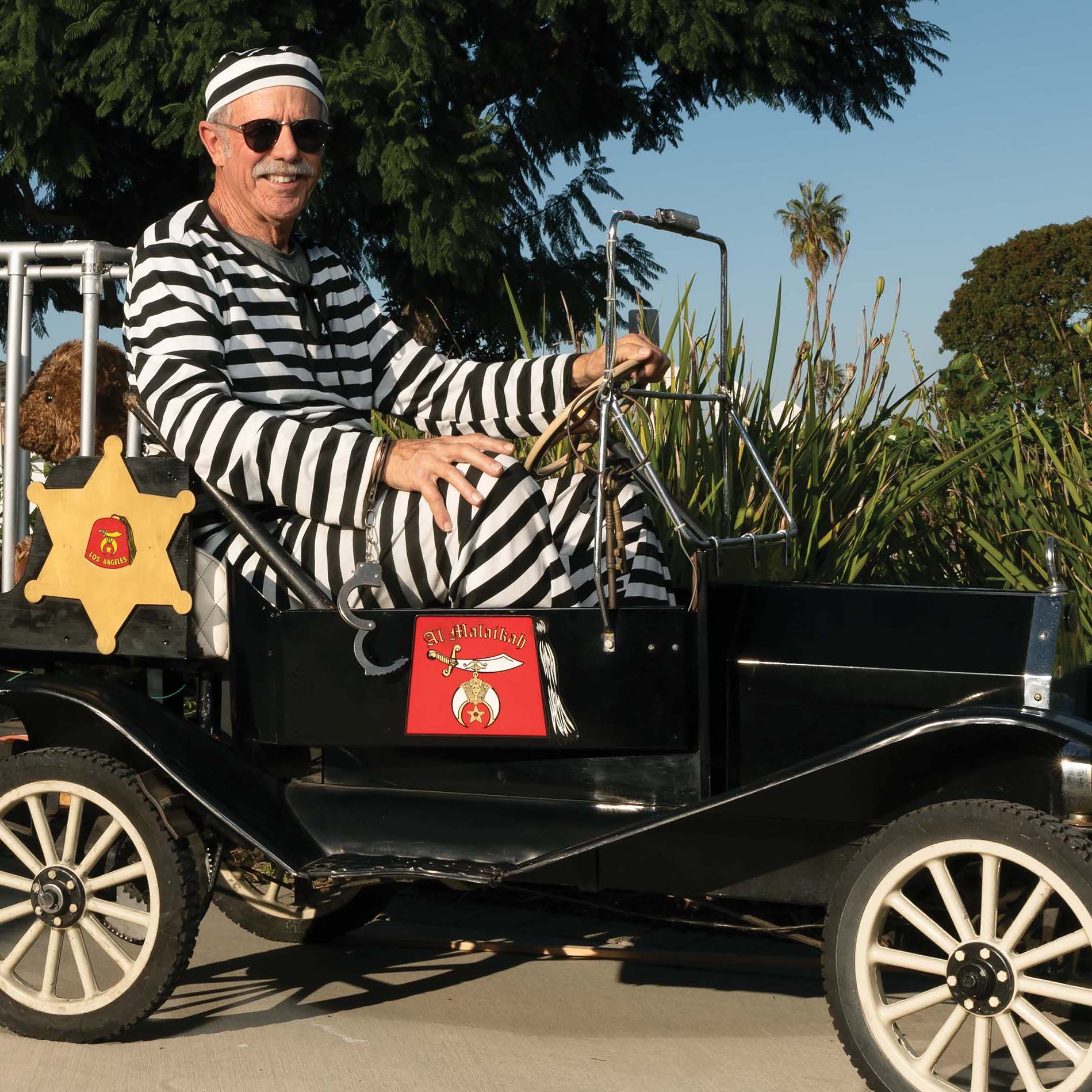 William Lavoie shows off his Special Ride: A Shriners Clown Car.