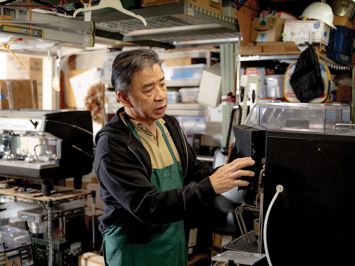 Fortunato Chua, a coffee machine technician and member of Francis Drake No. 376, Peninsula No. 168, and Phoenix No. 144 Masonic lodge, poses in his workshop.