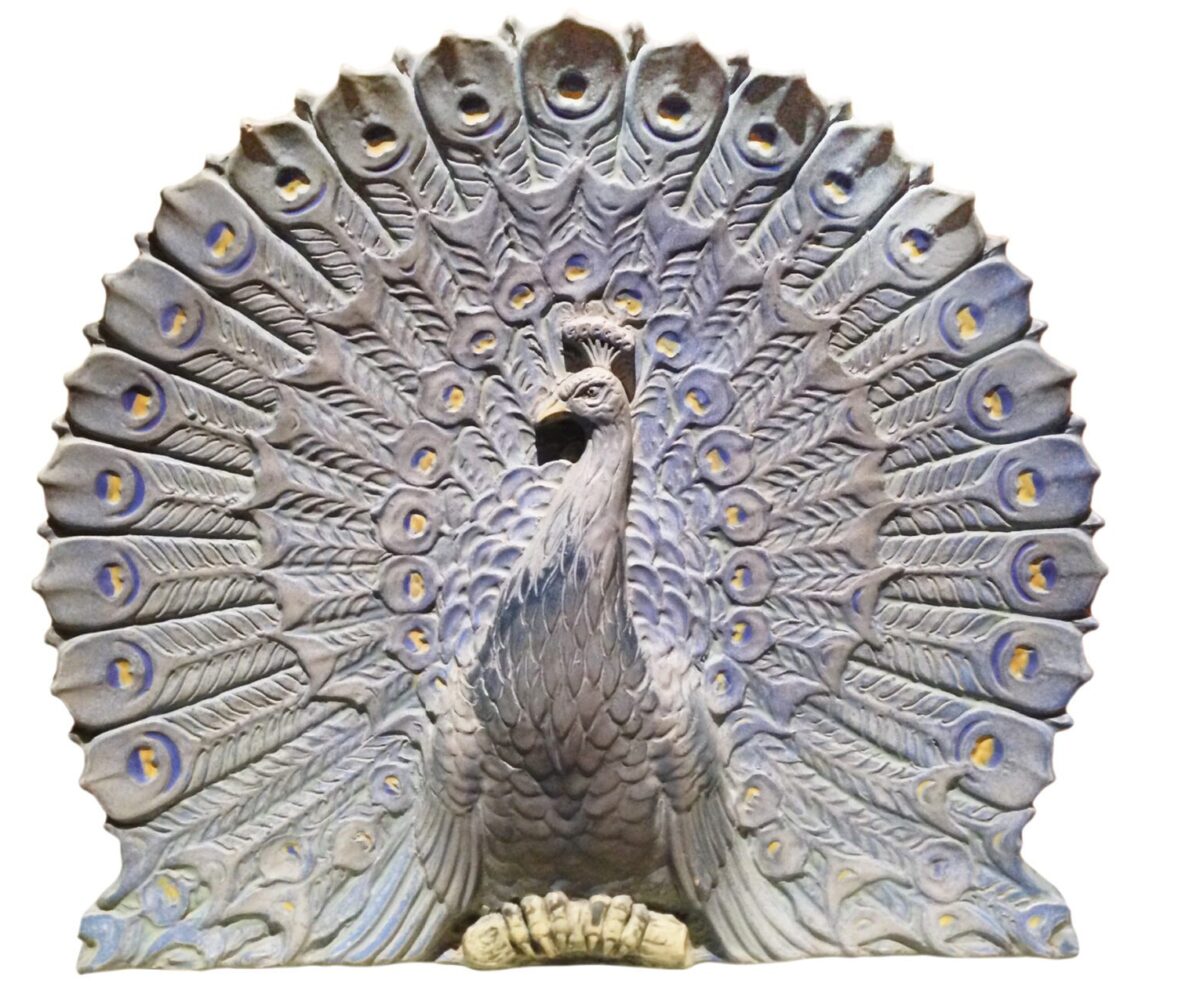 A terra cotta peakcock is also a Batchelder creation.
