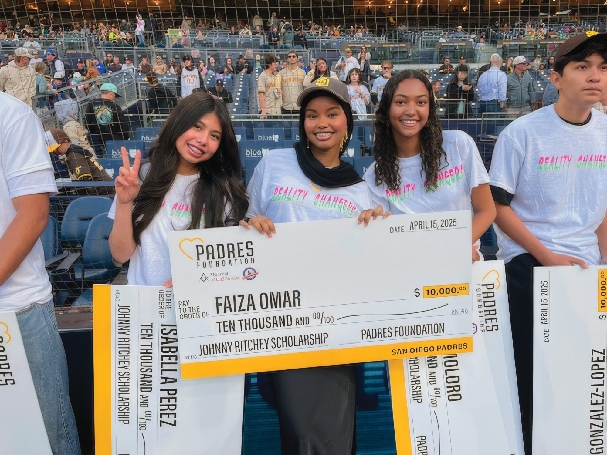 Students from Reality Changers of San Diego are recognized at a recent San Diego Padres game for receiving the Johnny Ritchie Scholarship Award.