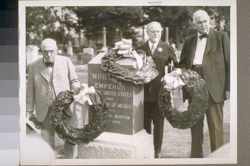 San Francisco, California - churchmen, and civic leaders paid tribute to San Francisco's famous Emperor Norton at reburial at Woodlawn Cemetery. A tombstone, perpetuating the memory of the self-appointed "Monarch" was unveiled as soldiers fired a salute. The inscription - Norton I, Emperor of the United States and Protector of Mexico. Joshua A. Norton -- 1819-1880. Photo shows L.2.R.: John McLaren, San Francisco Park commissioner, Wm. H. Crocker, San Francisco banker, and C. A. Shurtleff of the California Pioneers. Courtesy of UC Berkeley Bancroft Library.