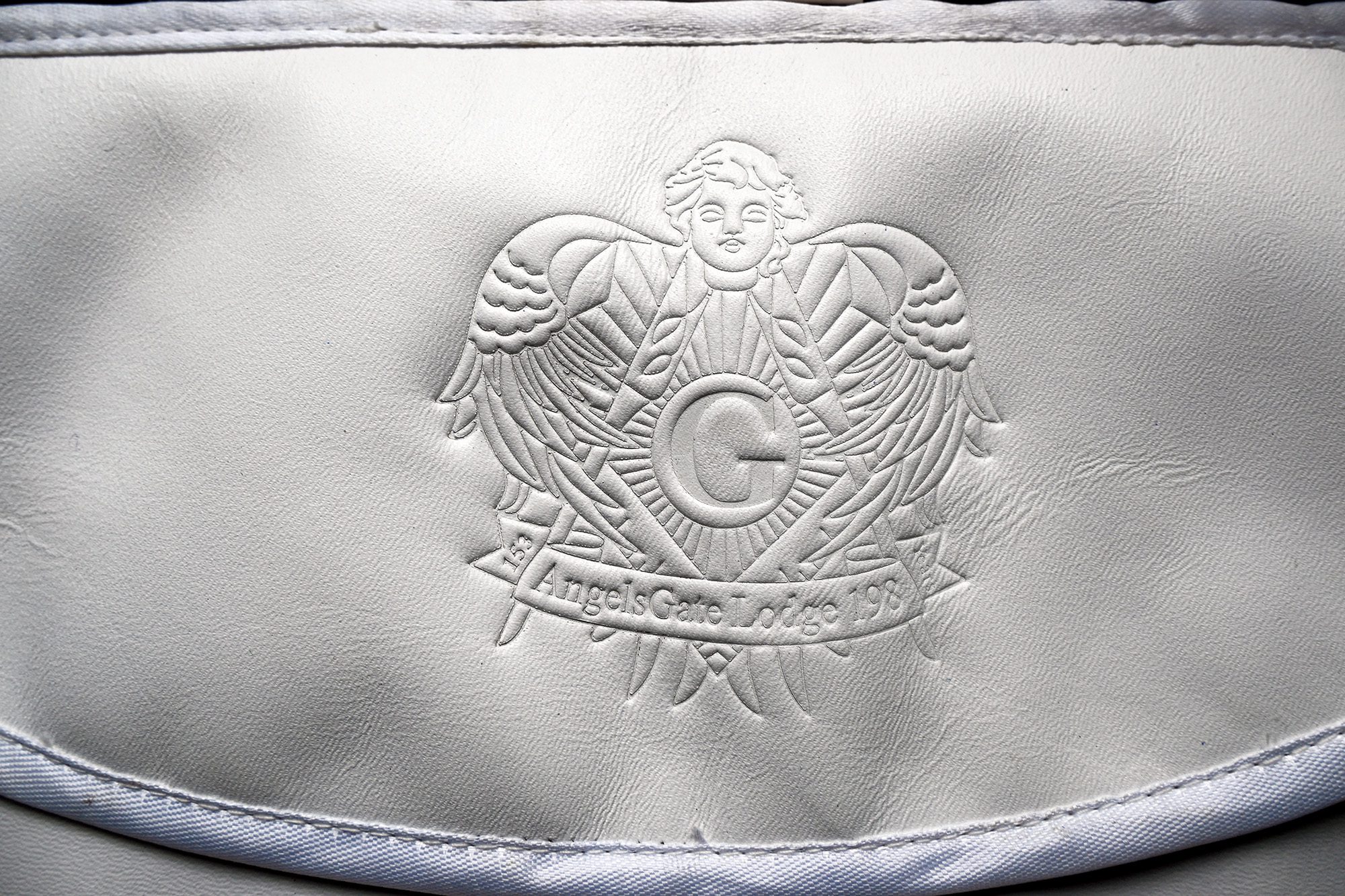 Embossed white leather apron courtesy of James Rualo